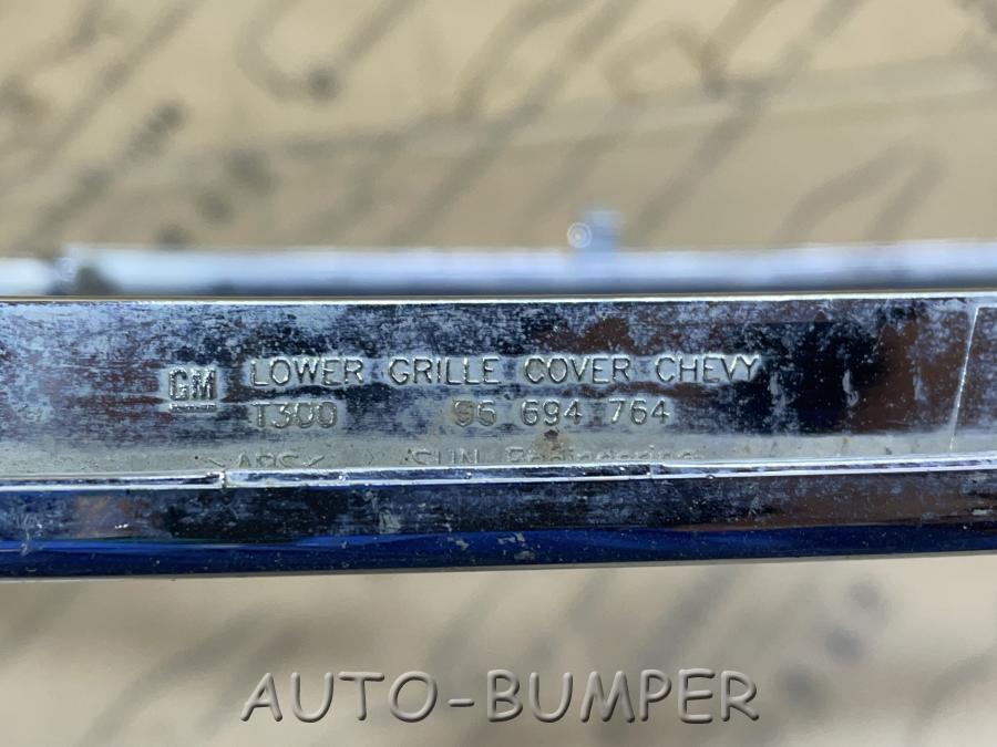 Chevrolet Aveo (T300) 2011- Рамка решетки радиатора 96694764